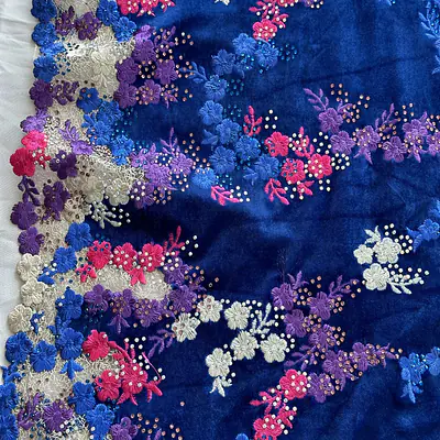 Webbed tulle, with royal velvet and fuschia and purple embroidery primary image
