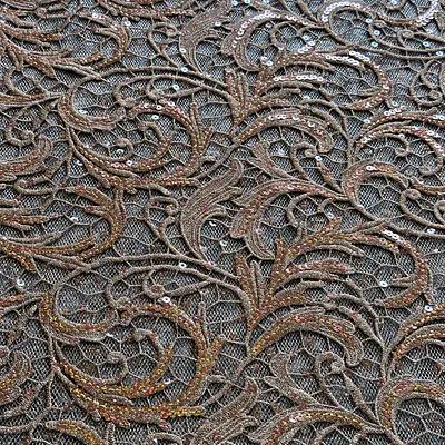 Rust / burnt orange guipure and sequins on tulle primary image