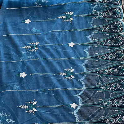 Teal tulle with emerald green velvet border patches and white embroidered  primary image