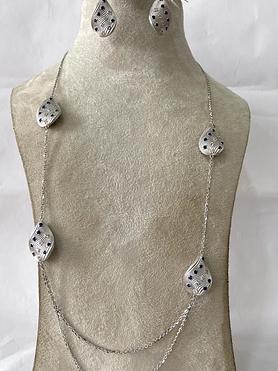 18kt white gold long necklace and blue stone. earrings and ring set